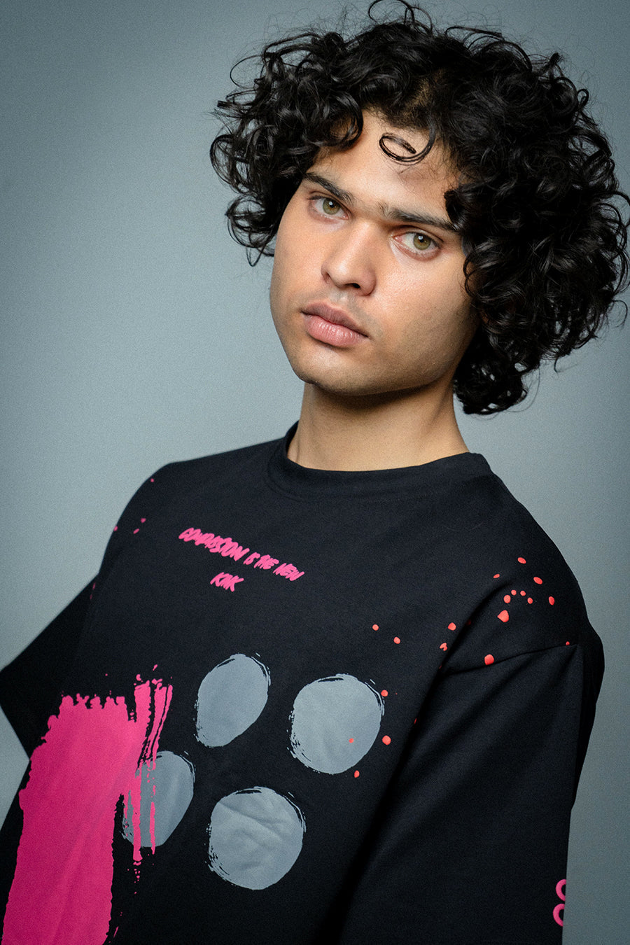 Male  model wearing Compassion is the New Kink T-shirt 