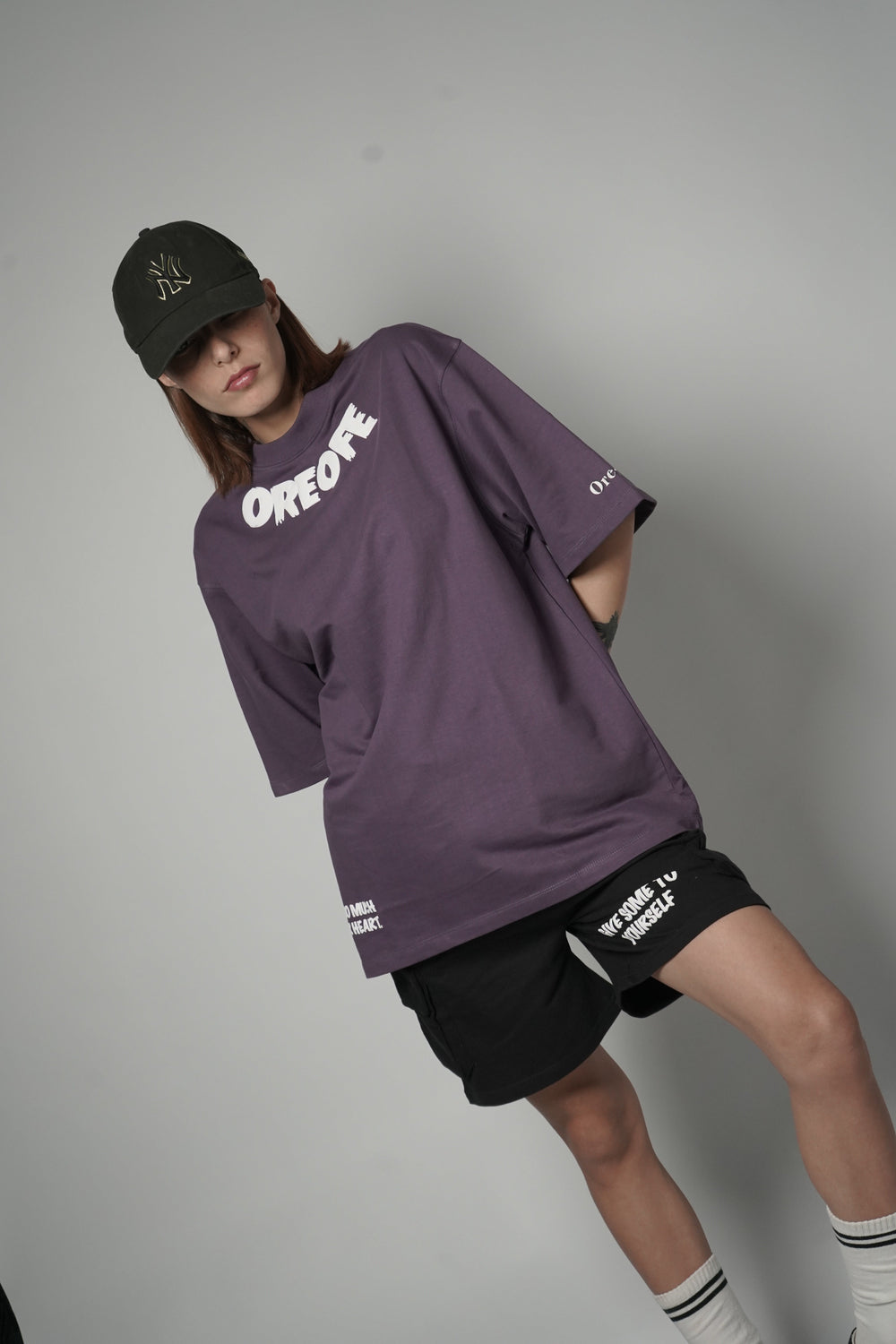 A model wearing Self Love Co-ord Set and a cap
