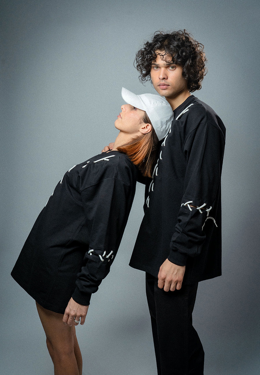 Male and female model wearing  full-length Korean oversized tee