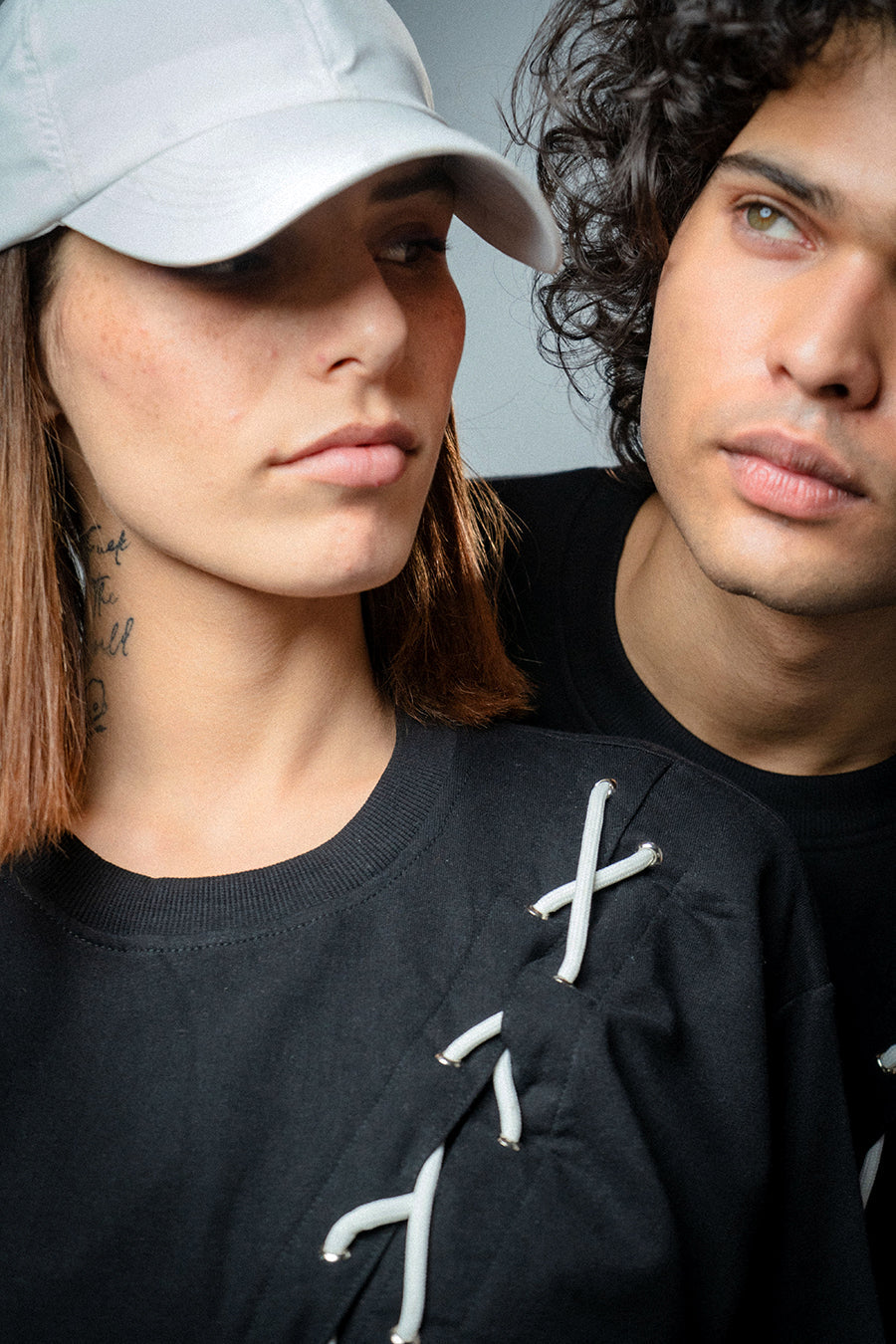 Male and female model wearing  full-length Korean oversized tee
