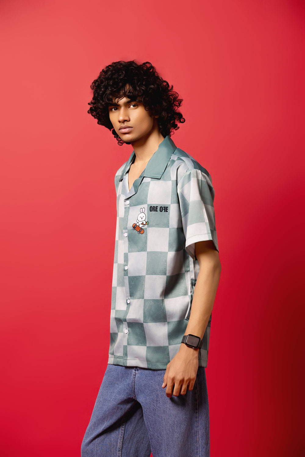 Model wearing the Skater Rabbit Button-Down Shirt made from Silk Satin, featuring a sublimation print.