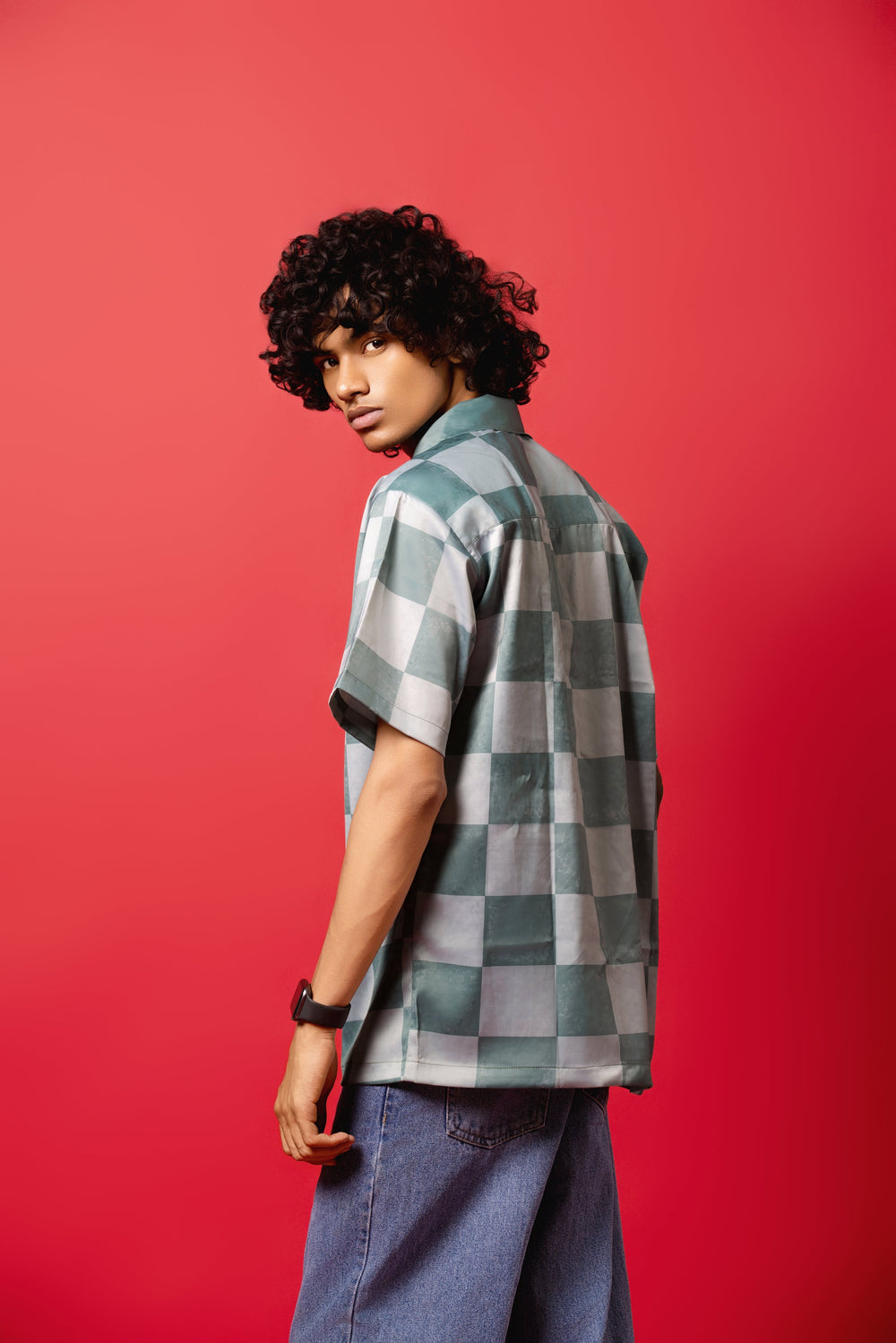 Model wearing the Skater Rabbit Button-Down Shirt made from Silk Satin, featuring a sublimation print.