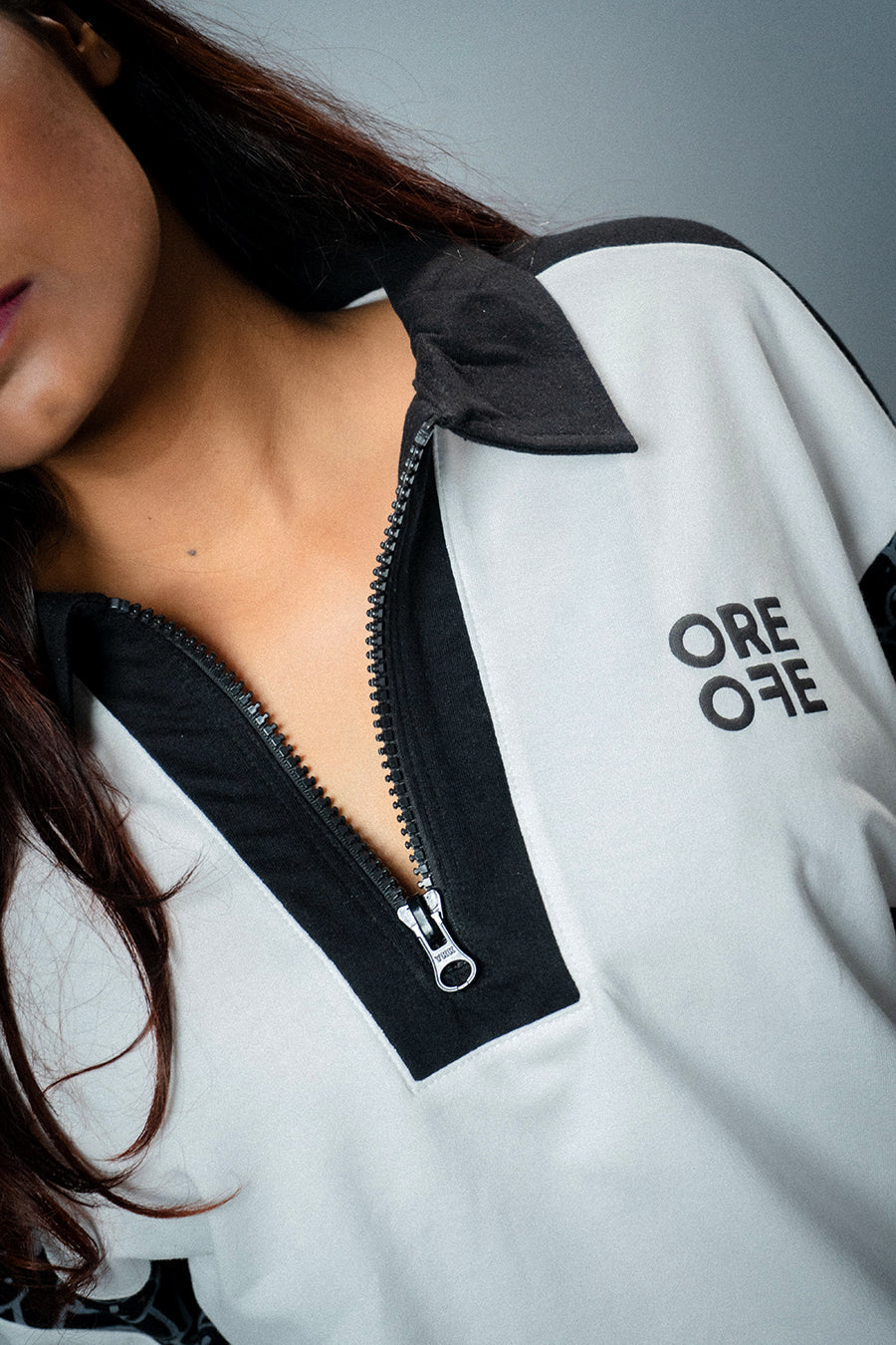 A girl wearing White & Black Oversized Polo