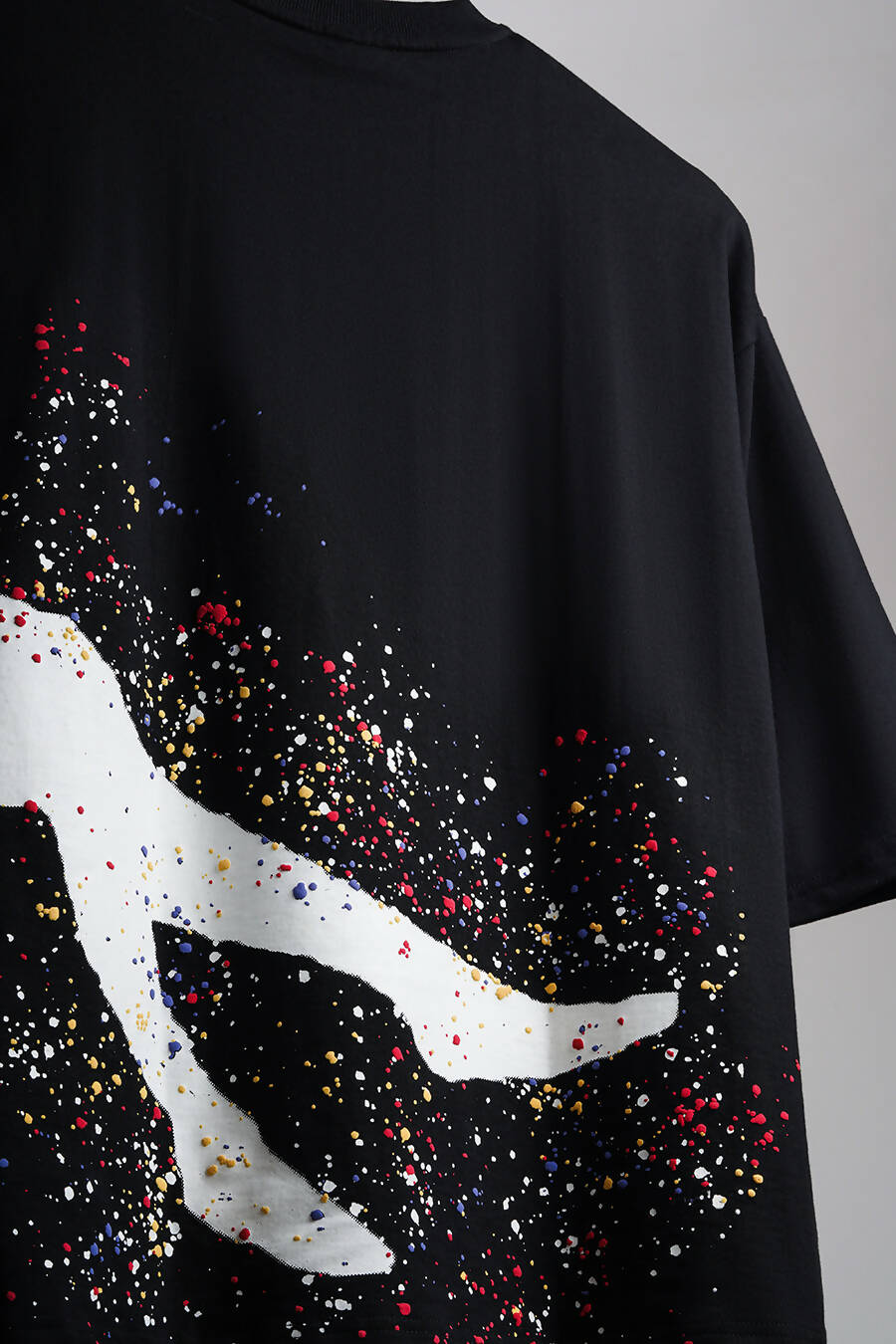 black oversized tshirt. puff printed. streetwear fashion.